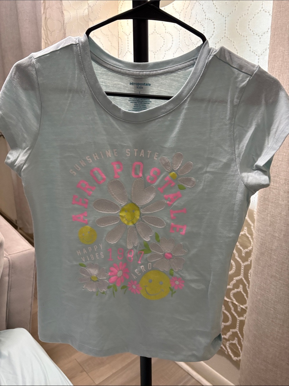 Aeropostale Girls' Light Blue Daisy Smile Graphic Tee
